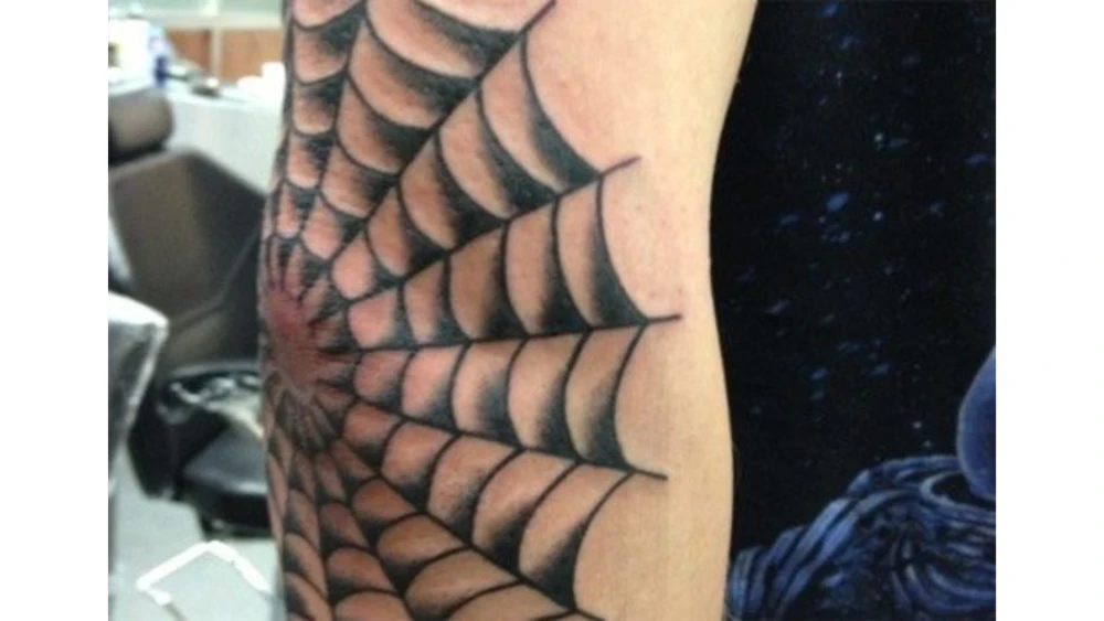 Cobweb tattoo