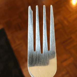 Why is There a Notch in a Cake Fork?